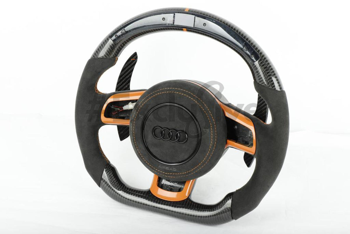 Custom Audi R8 and TT steering wheel by Exclusive Steering, featuring leather and metal accents, designed for 2008-2015 models.