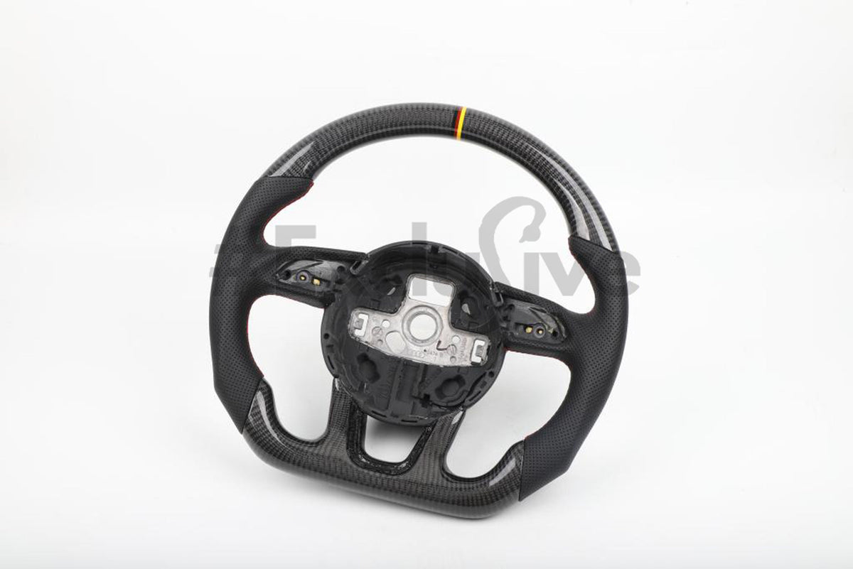 Custom Audi R8 and TT steering wheel by Exclusive Steering, featuring a sleek, sporty design for 2008-2015 models.