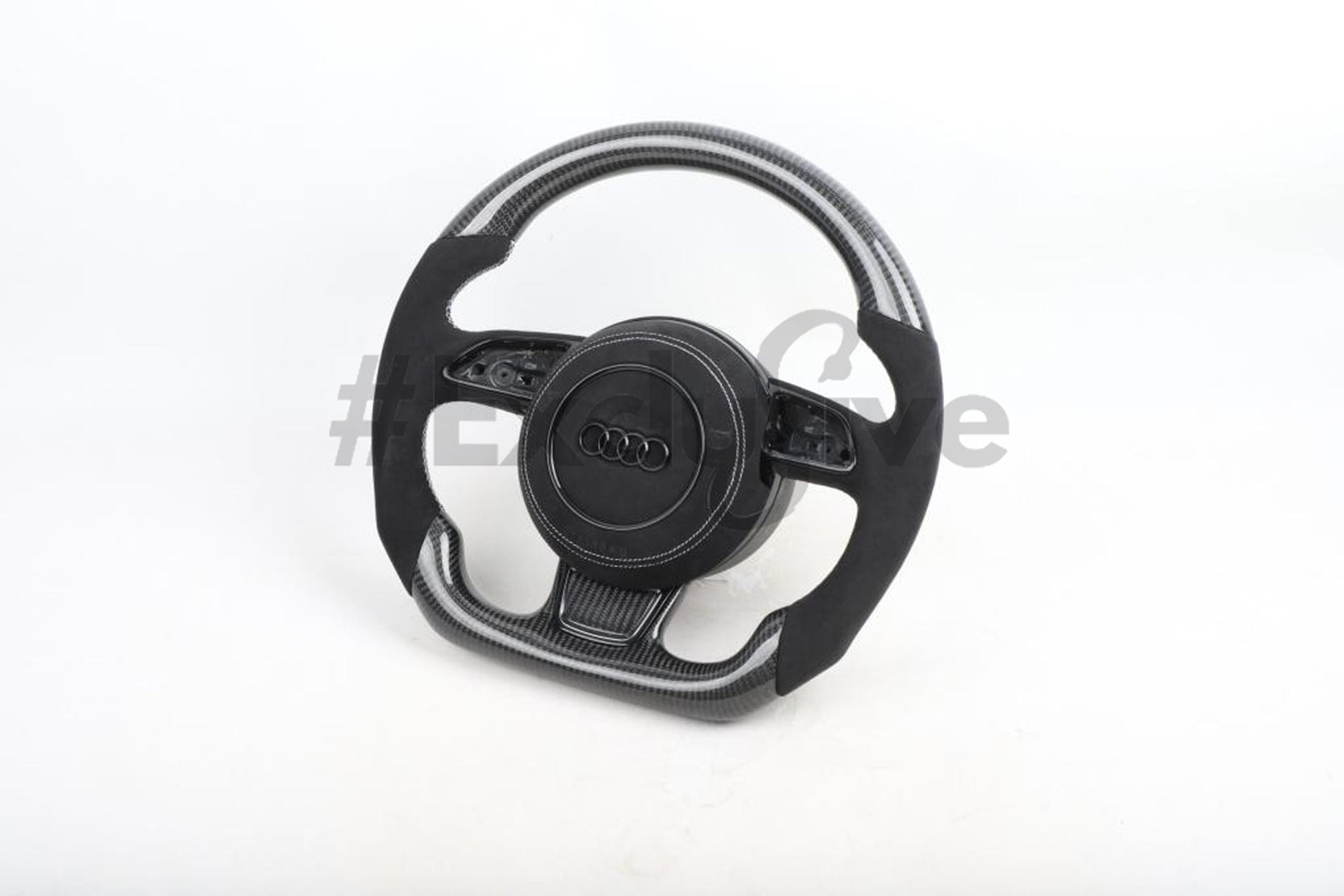 Custom Audi R8 and TT steering wheel by Exclusive Steering, featuring a sleek black leather and silver accents design.