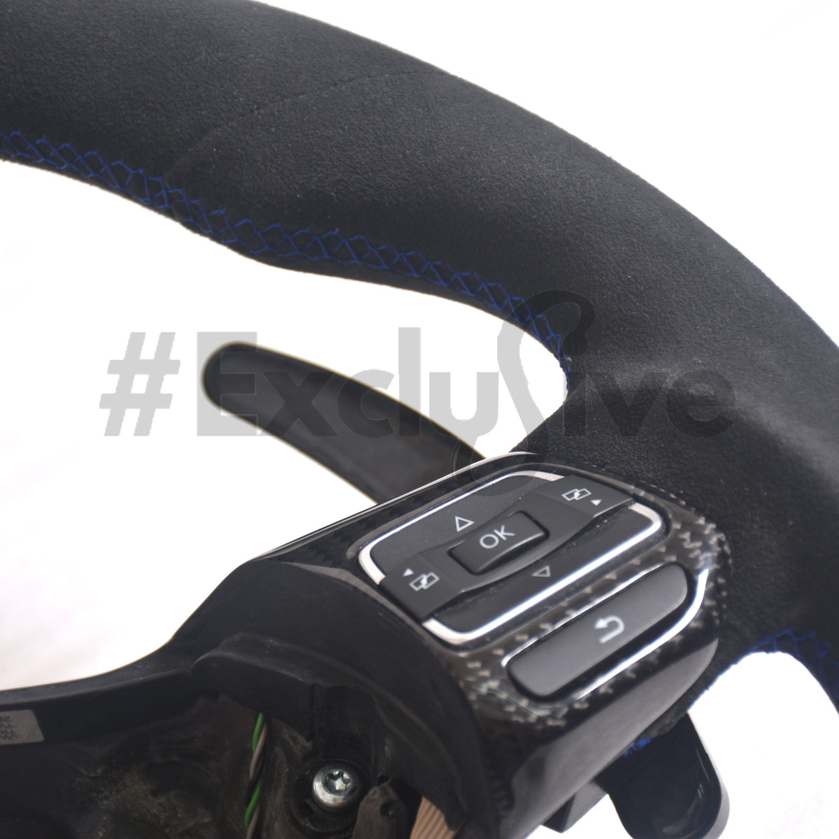 Volkswagen Golf MK6 GTI/R custom steering wheel by Exclusive Steering, black leather with silver accents, detailed stitching.