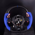 Volkswagen Golf MK6 GTI/R custom steering wheel by Exclusive Steering, black leather with silver accents, mounted on car steering column