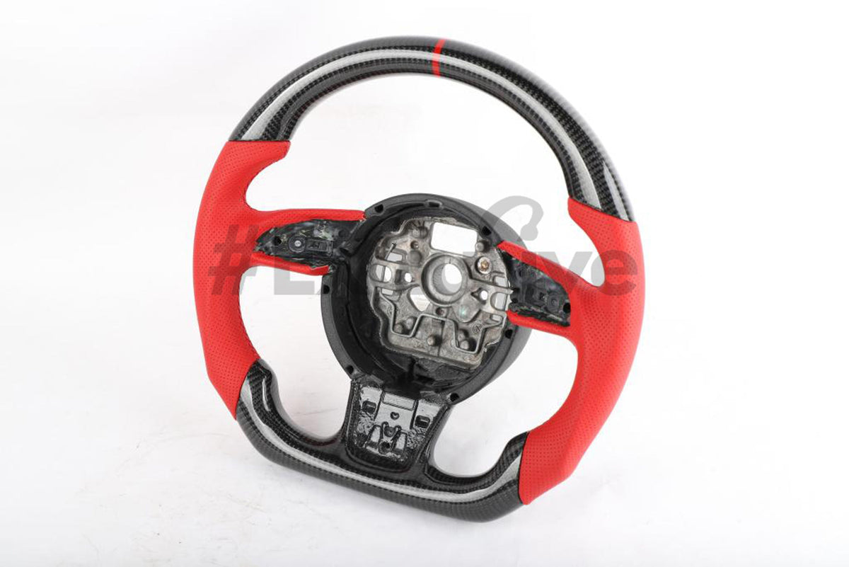 Custom steering wheel for Audi A3, A4, A5, A6, A7, A8, S3, S4, S5, S6, S7, S8, RS7 by Exclusive Steering, close-up view.