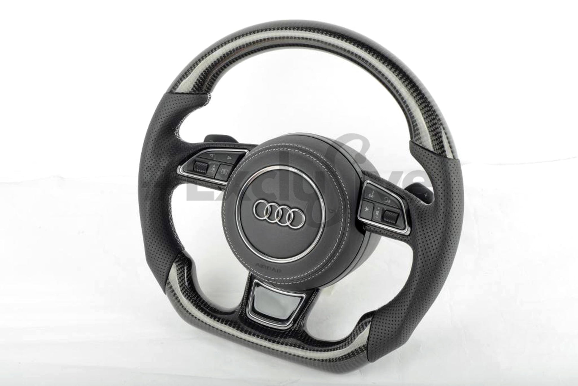 Custom Audi steering wheel for 2012-2018 A3, A4, A5, A6, S3, S4, S5, S6, S7, S8, RS7 by Exclusive Steering, close-up view.