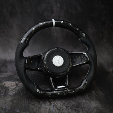 Volkswagen Golf MK7 GTI & R custom steering wheel by Exclusive Steering, black leather with red stitching and sporty design.