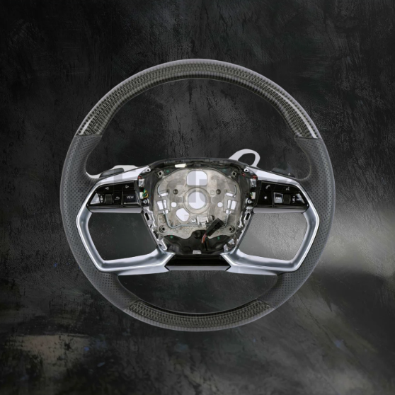 Custom Audi A8/E-tron steering wheel by Exclusive Steering with black leather wrapping and silver accents, designed for 2016-2020 models.