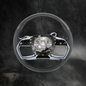 Custom Audi A8/E-tron steering wheel by Exclusive Steering with black leather wrapping and silver accents, designed for 2016-2020 models.