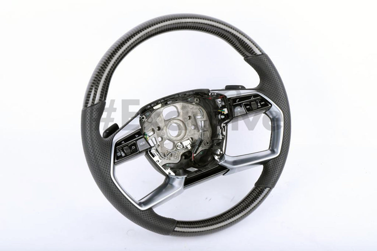 Custom Audi A8/E-tron steering wheel by Exclusive Steering, featuring leather wrapping and sporty design for 2016-2020 models.