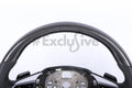Custom Audi A8/E-tron steering wheel by Exclusive Steering, black leather with silver accents, detailed close-up of the steering wheel surface.