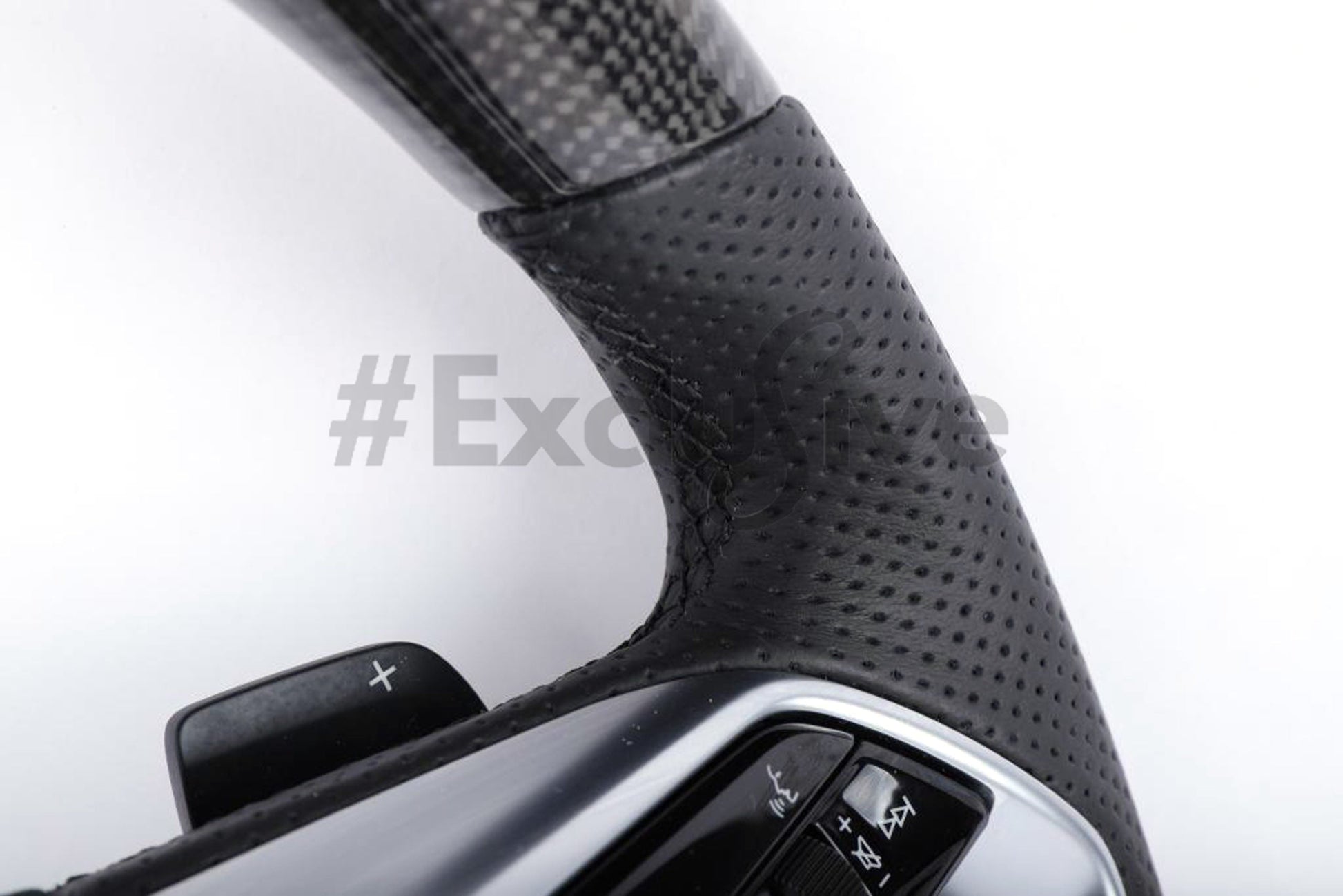Custom Audi A8/E-tron steering wheel by Exclusive Steering, featuring leather grips and premium stitching for 2016-2020 models.