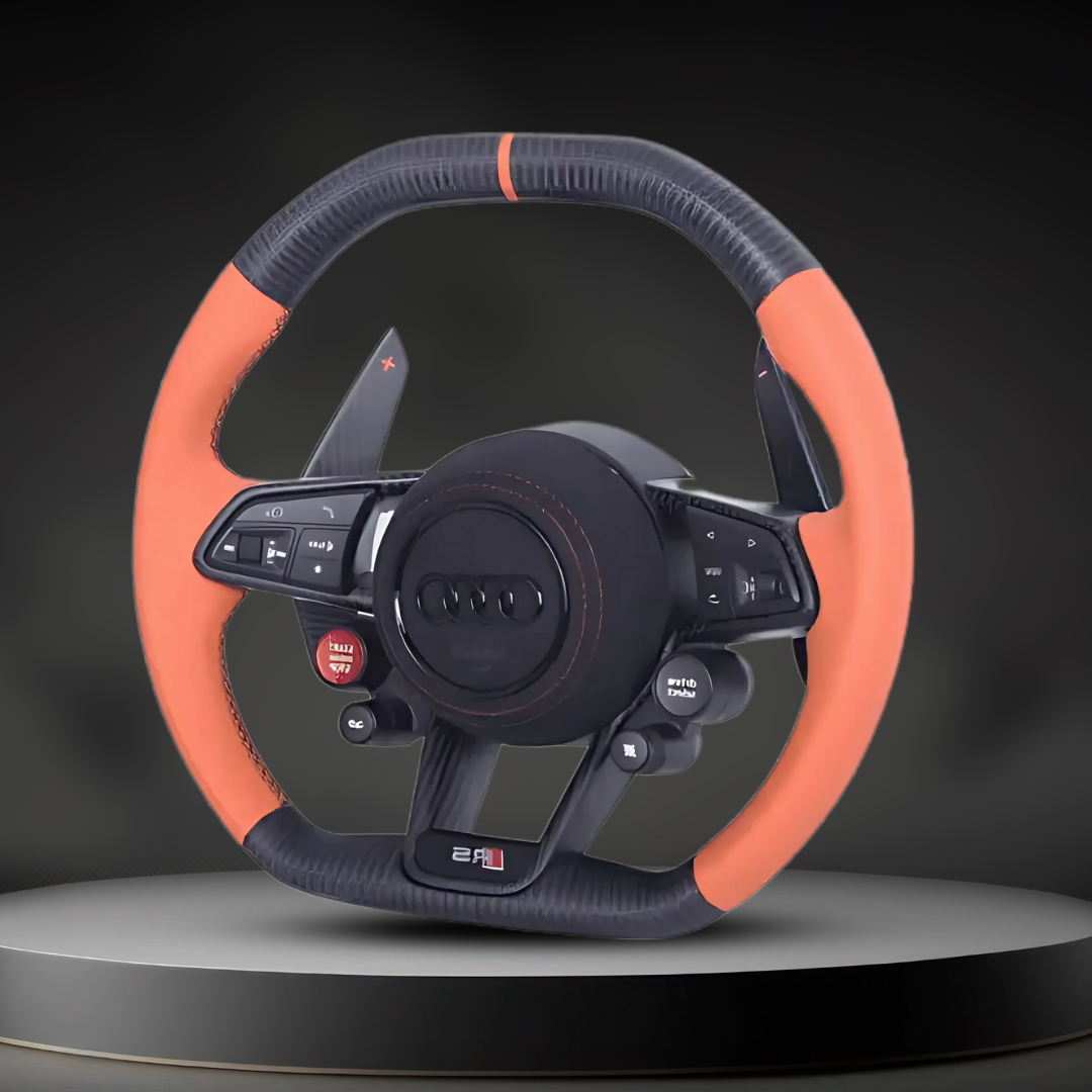 Custom Audi R8 and TT steering wheel by Exclusive Steering, featuring a sleek leather design and intricate stitching.