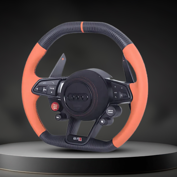 Custom Audi R8 and TT steering wheel by Exclusive Steering, featuring a sleek leather design and intricate stitching.