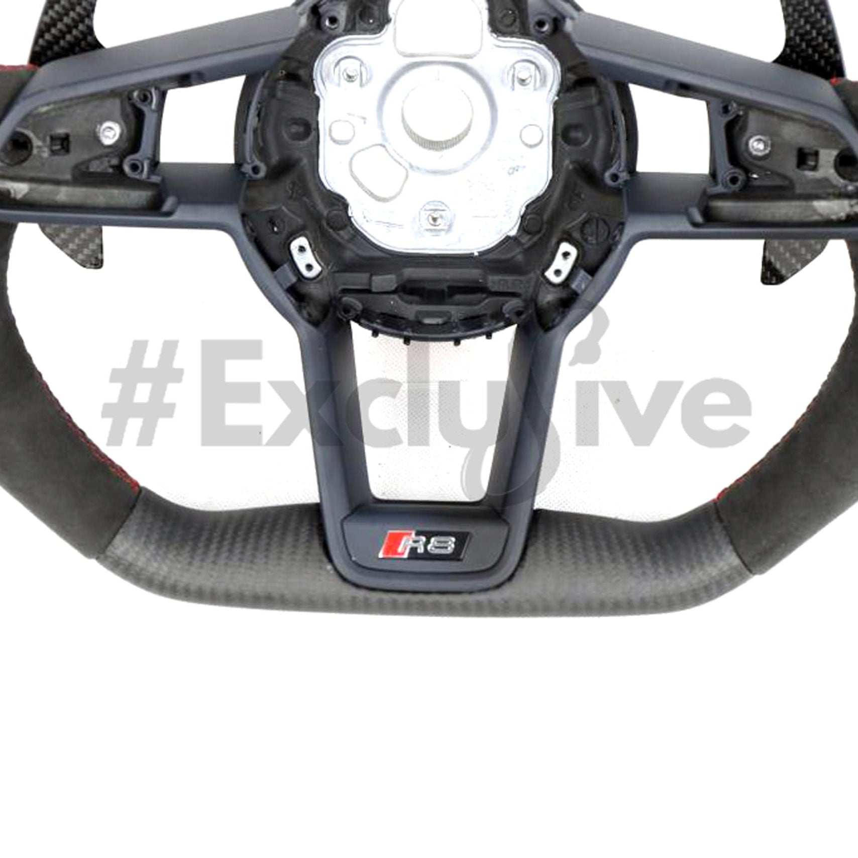 Custom Audi R8 and TT steering wheel by Exclusive Steering, featuring a sleek leather grip and detailed stitching.