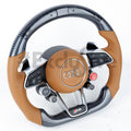 Audi R8 and TT custom steering wheel by Exclusive Steering, featuring premium leather and sleek design for sporty driving comfort.