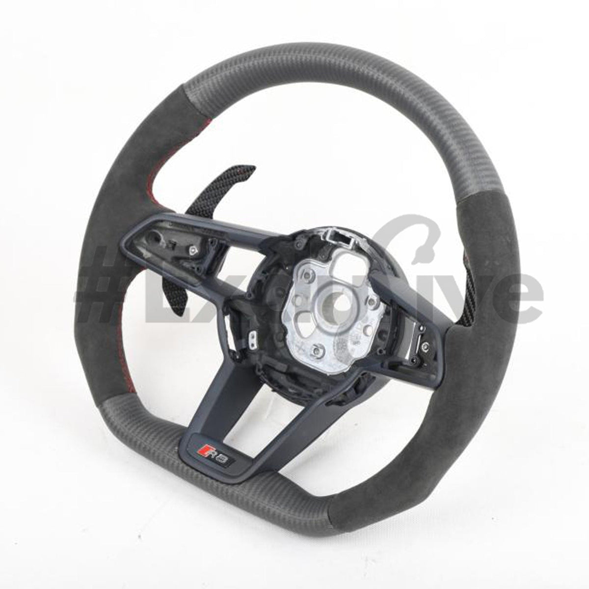 Audi R8 and TT steering wheel by Exclusive Steering, custom black leather with silver accents, detailed stitching and sporty design.
