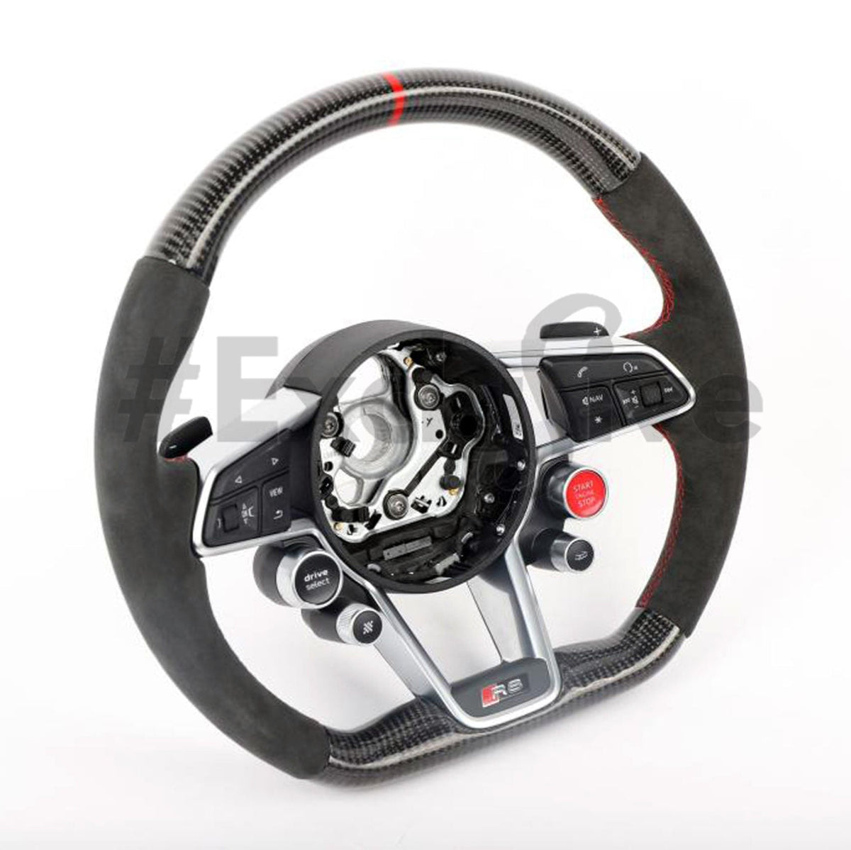 Close-up of the black Audi R8/TT steering wheel by Exclusive Steering with textured grip and branded logo at the center.