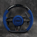 Audi R8 and TT 2016-2023 custom steering wheel by Exclusive Steering, close-up of the sporty leather and metal design
