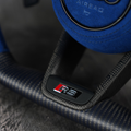 Custom Audi R8 and TT steering wheel by Exclusive Steering, featuring a sleek leather design and detailed craftsmanship.