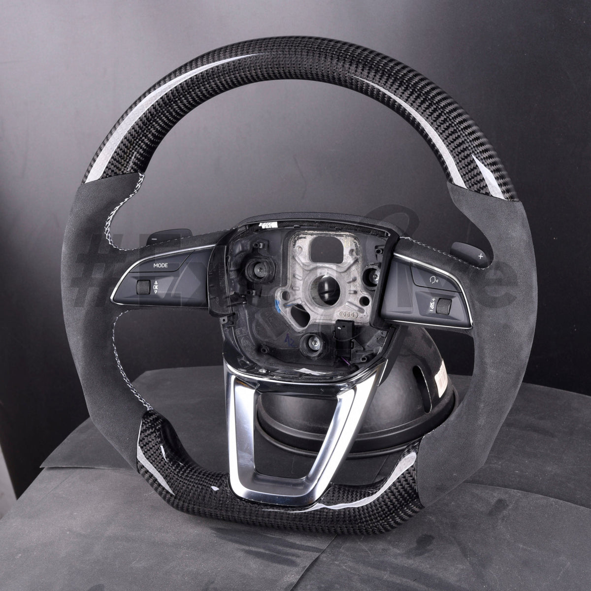 Custom Audi Q3 Q5 Q7 Q8 SQ5 SQ7 steering wheel by Exclusive Steering, black leather with silver accents and multi-function controls.