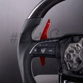 Custom Audi Q3 Q5 Q7 Q8 SQ5 SQ7 steering wheel by Exclusive Steering, featuring premium leather and intricate stitching.