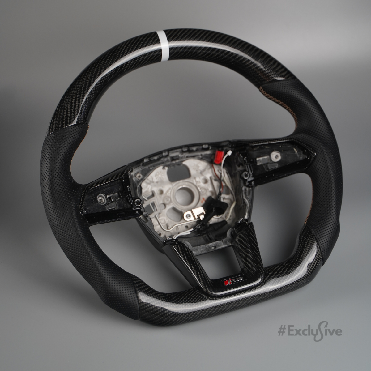 Custom Audi A6, S6, RS6, A7, S7, RS7, C8 steering wheel by Exclusive Steering with leather grip and silver accents.