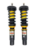 Yellow Speed Racing Dynamic Pro Sport coilovers installed on a 2008-2016 Audi A4 B8 sedan with adjustable suspension components