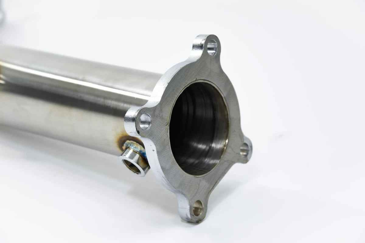 ARM Motorsports Audi A4 B8 3-inch test pipe downpipe, showcasing the shiny metal pipe with mounting flanges and precise welds.