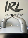 IRL LLC MaxFlow Race downpipe for Audi C8 RS7, high-performance exhaust upgrade with metal construction and detailed fittings.