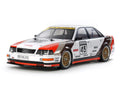 TAMIYA 58682-60A 1991 Audi V8 Touring 1/10 scale 4WD electric RC car kit with detailed body and TT-02 chassis, assembled for display.