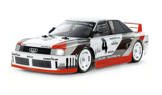 Tamiya Audi 90 Quattro Racing 1/10 scale 4WD electric touring car kit with detailed body and racing components, suitable for RC racing enthusiasts.
