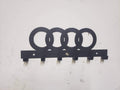 Steel wall-mounted Audi logo keychain rack by Martin Metalwork LLC, Euro car organizer with orange Audi emblem and multiple hooks.