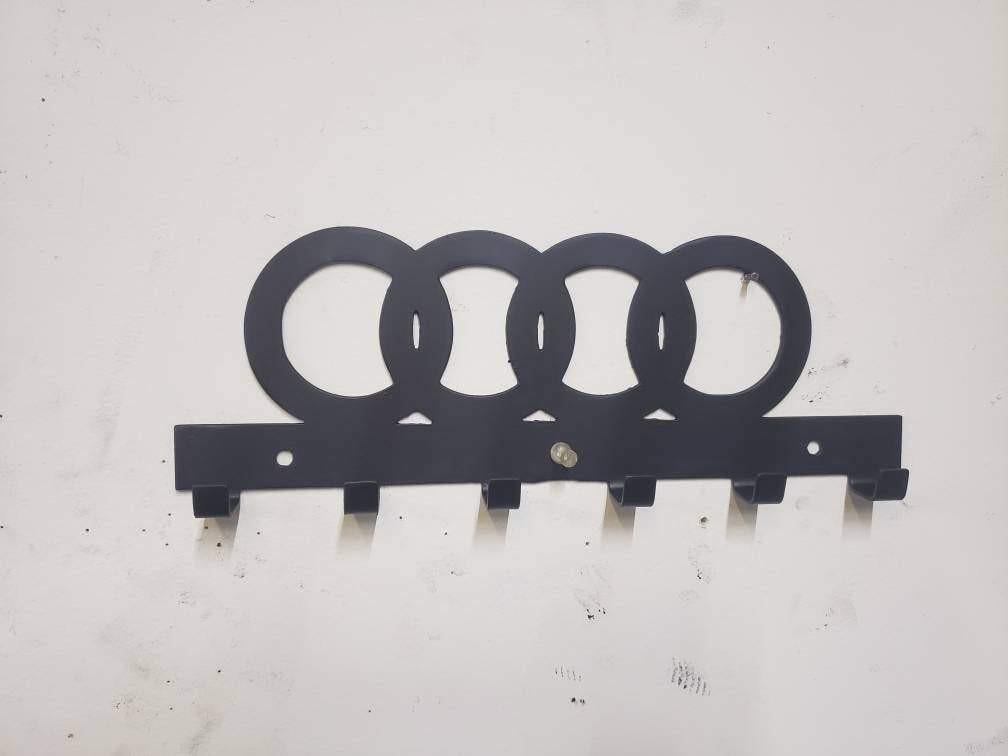 Steel wall-mounted Audi logo keychain rack by Martin Metalwork LLC, Euro car organizer with orange Audi emblem and multiple hooks.