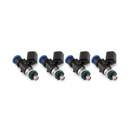 Set of four MOTIV Injector Dynamics ID1050XDS fuel injectors with metal connectors and precise spray patterns.