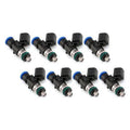 Set of four MOTIV Injector Dynamics ID1050XDS fuel injectors for high-performance fuel delivery in automotive applications.