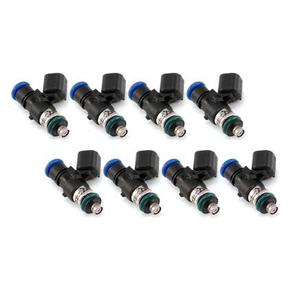 Set of four MOTIV Injector Dynamics ID1050XDS fuel injectors for high-performance fuel delivery in automotive applications.