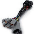 Audi performance wiring harness with multi-colored cables and gray connectors for enhanced vehicle electronics