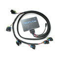 Motiv ReFlex LITE advanced sequential injector controller mounted on engine engine for precise fuel injection management