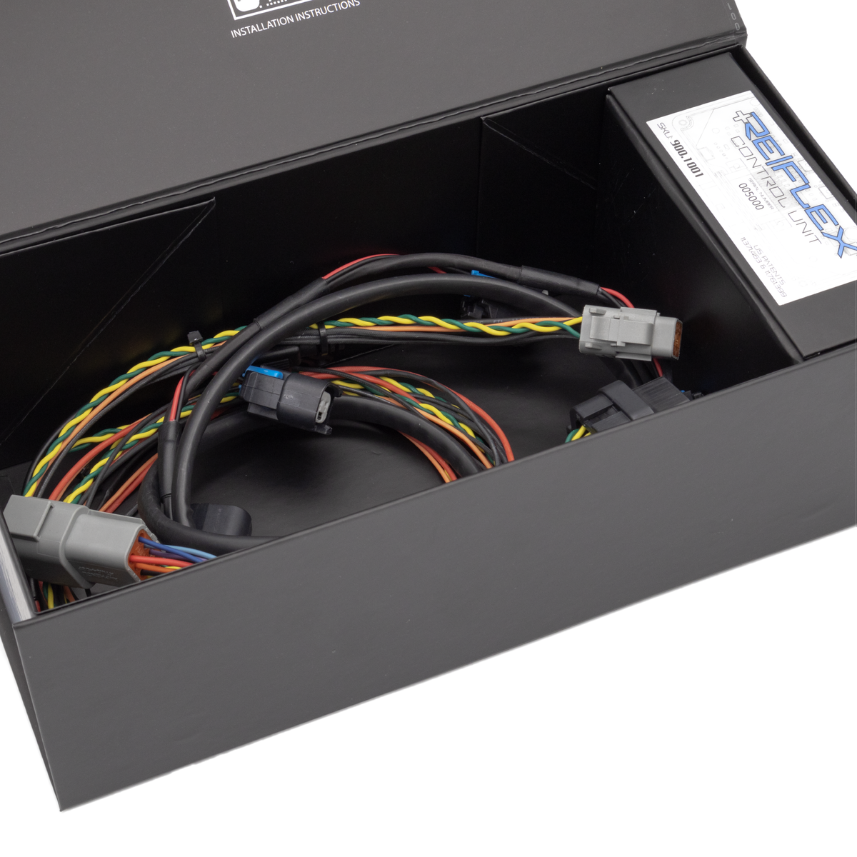 Motiv ReFlex+ Advanced I/O Integration for Inline-6 engine, universal module with multiple input and output connections.