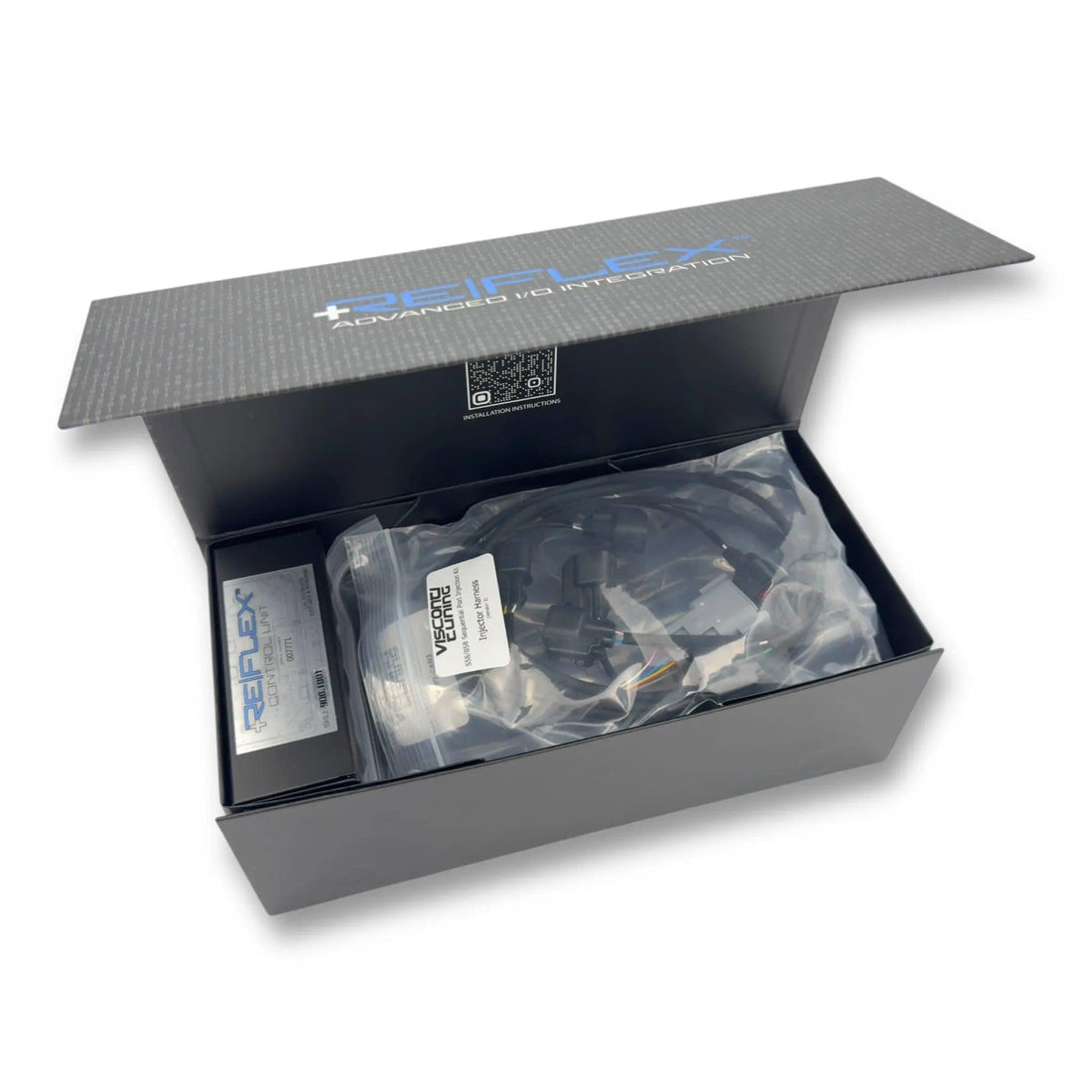 MOTIV ReFlex+ Advanced I/O Integration device for BMW B58 and S58 engines, plug-and-play installation, compact electronic module.