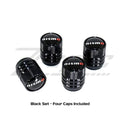 NISMO Nissan tire valve stem cap set in black, featuring sleek, durable caps for vehicle wheel valves.