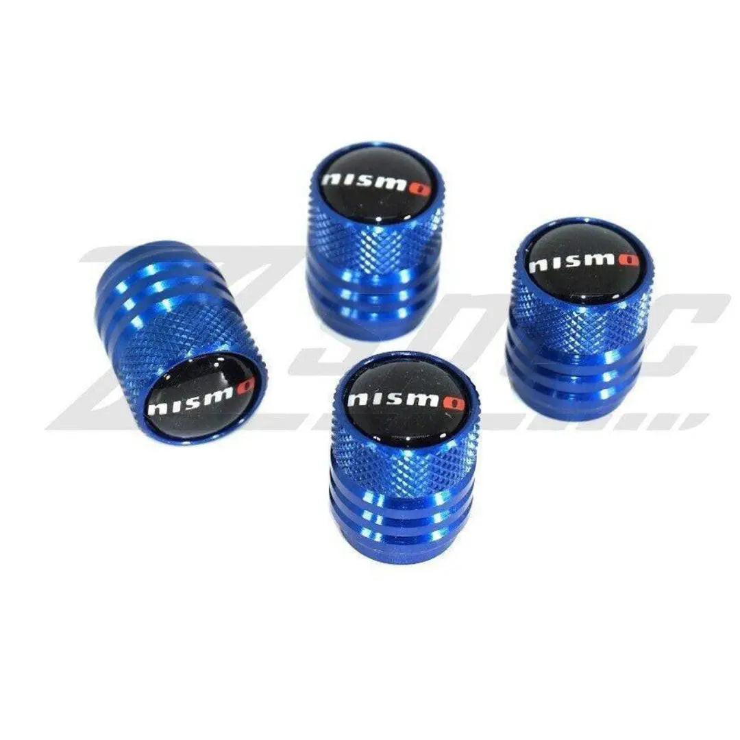 Blue NISMO Nissan tire valve stem cap set featuring sleek, durable caps with NISMO branding for a stylish automotive upgrade.