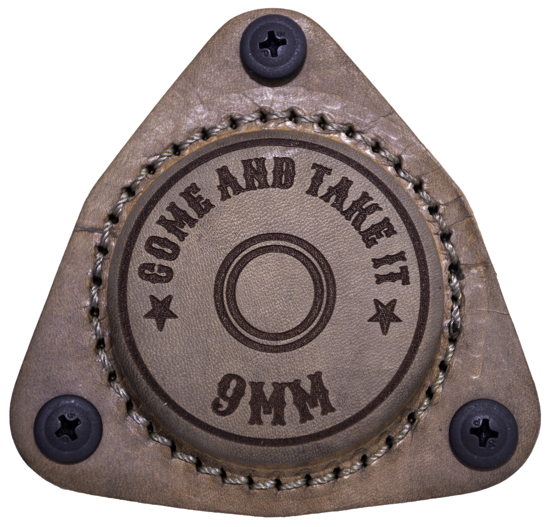 Black SofHold 9mm bullet magnetic holster mounted on a gun magnet stand for quick access and secure storage.