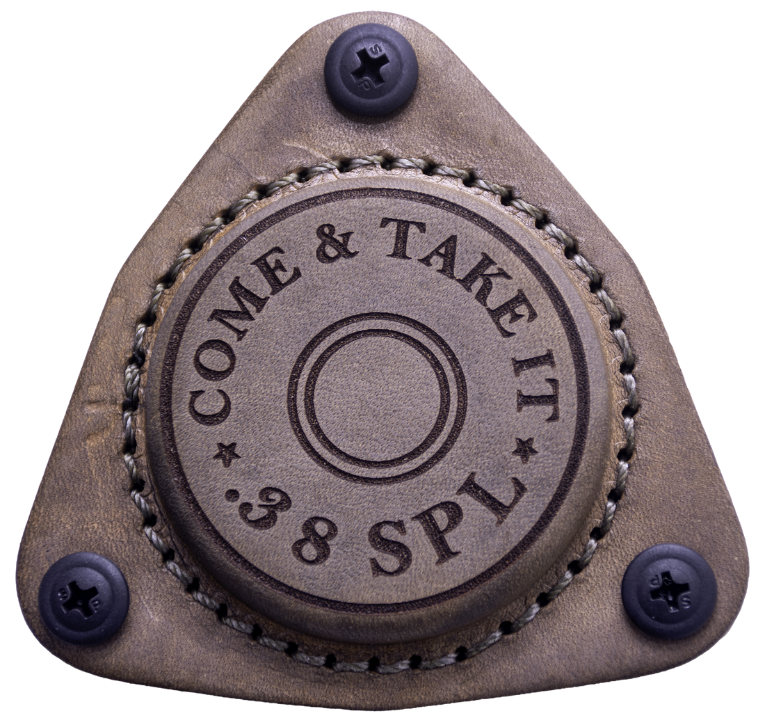 Black SofHold Come & Take It 38 SPL magnetic gun mount attached to a firearm for secure, quick access.