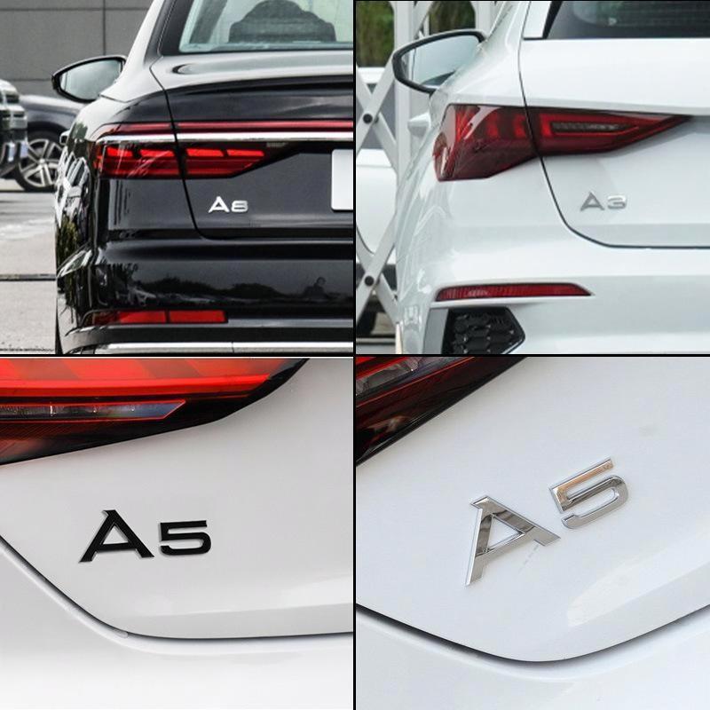 Black Audi A1 rear badges by V.I.P Digital Presence, showing the emblems on the car's rear.