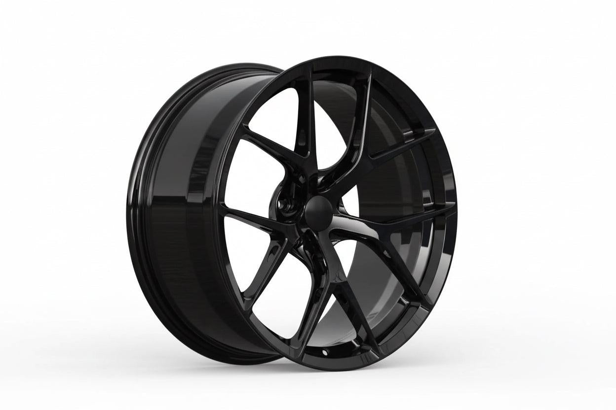 Set of Vorsprung Forged VA-000 Style Wheels by Vorsprung Autowerk, featuring sleek multi-spoke design on a vehicle.