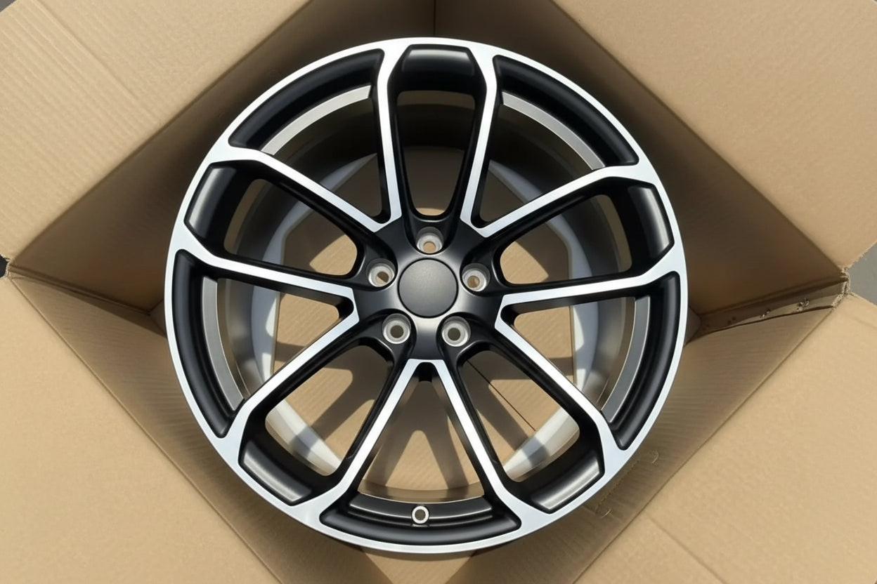 Set of Vorsprung Forged VA-011 Style Wheels by Vorsprung Autowerk, featuring a sleek silver finish and multi-spoke design.