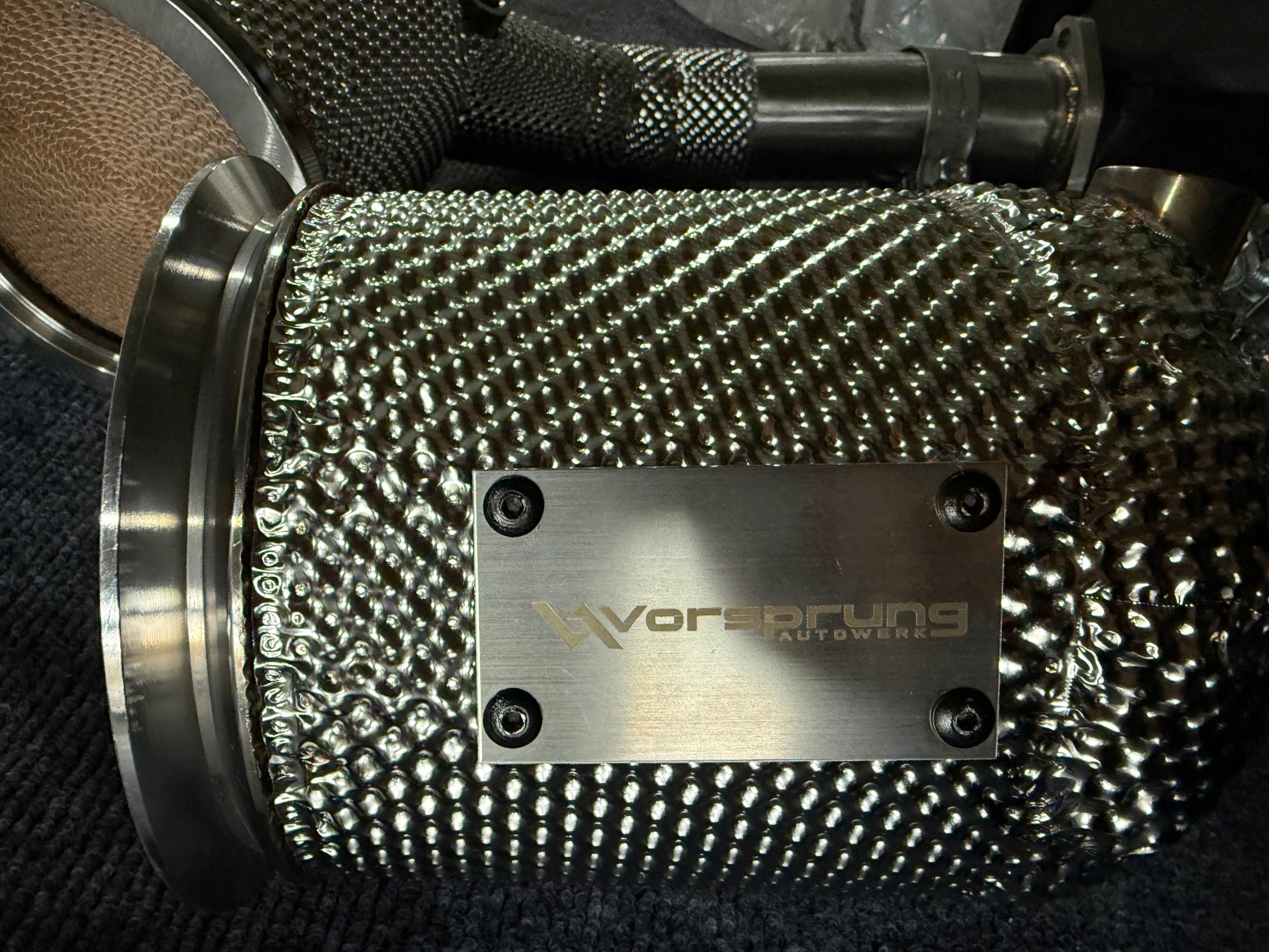 Vorsprung Autowerk performance intercooler pipe with textured mesh and branded plate for Audi tuning