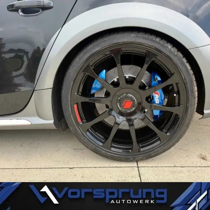 Audi B8.5 rear wheel with black alloy rim and blue big brake kit upgrade