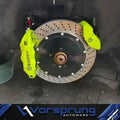 Upgraded Audi rear brake kit with ventilated drilled rotor and yellow Brembo calipers