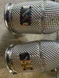 High-performance Audi intercooler pipes with braided mesh and custom logo plates for enhanced airflow and power
