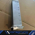 Audi 3.0T V6 supercharged EA837 engine oil cooler on cardboard surface